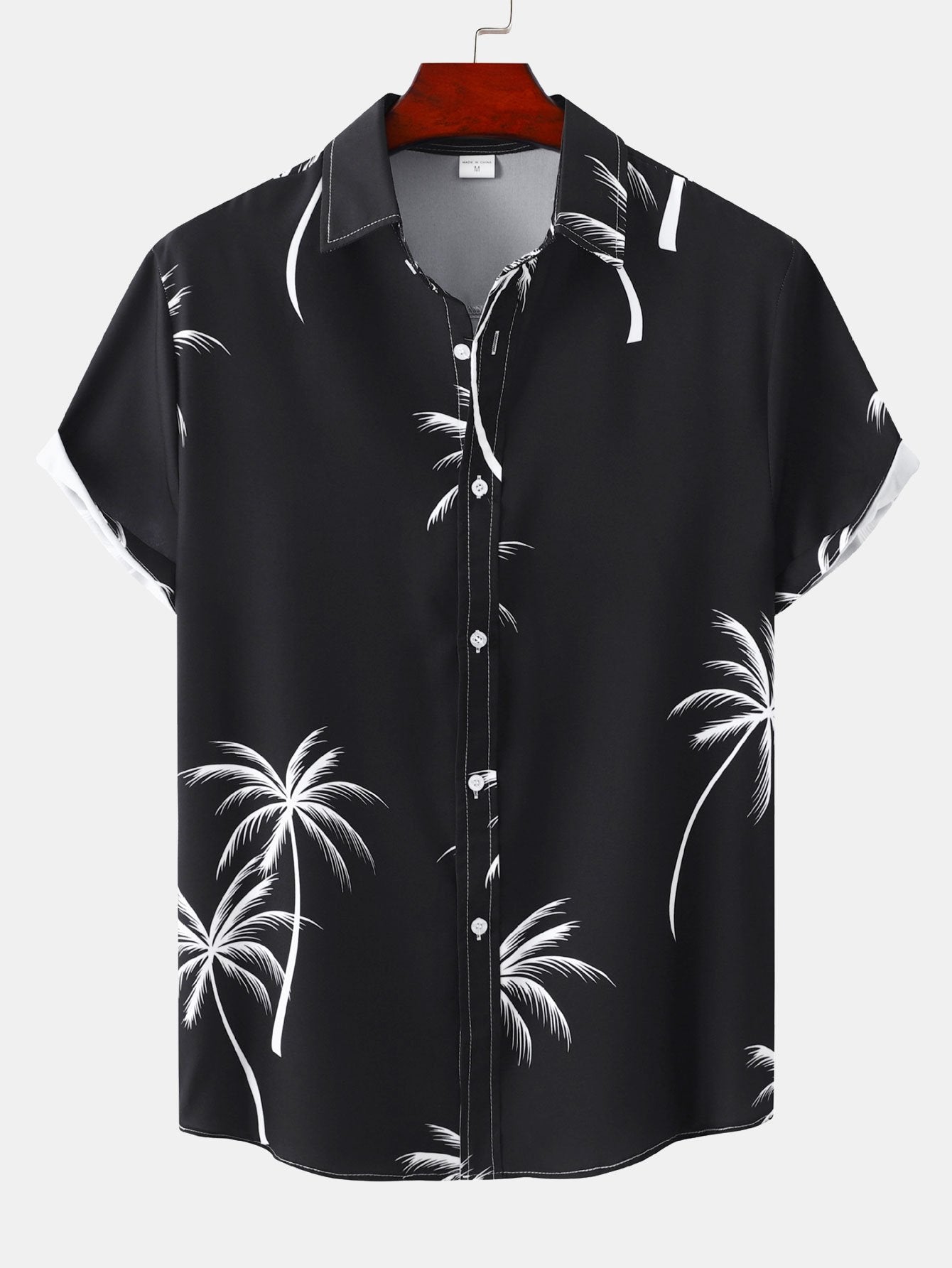 Chemise boutonnée à imprimé feuilles tropicales