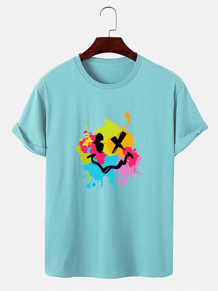 T-shirt imprimé visage souriant avec éclaboussures de boue colorées